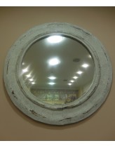 Круглое зеркало в серой раме